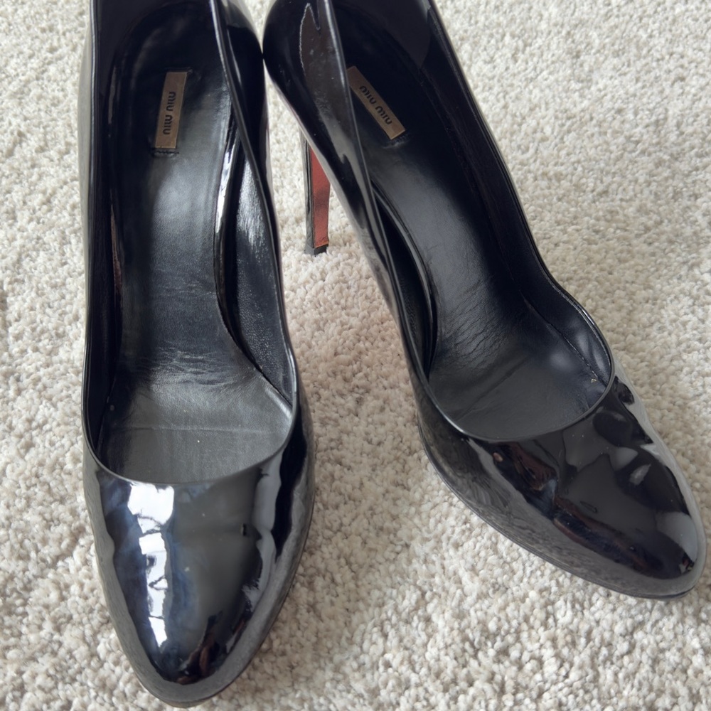 Miu Miu black patent leather pumps